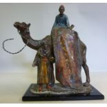 An early 20thC painted spelter novelty t