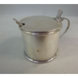 An Edwardian silver mustard pot of cylin