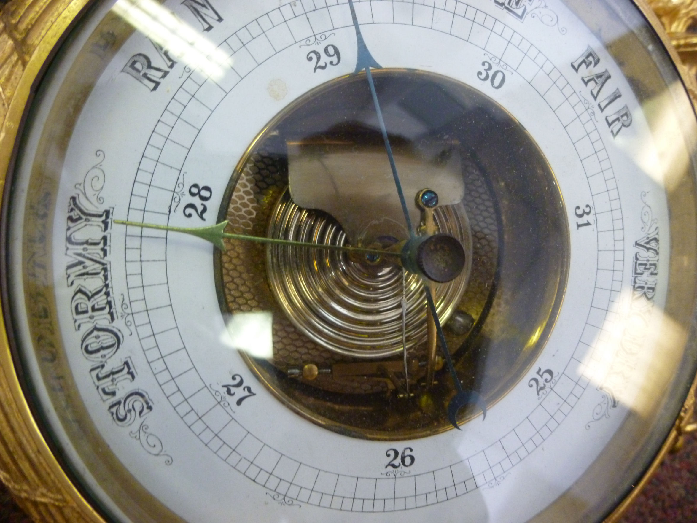 A late 19thC gilt brass barometer, ornat - Image 5 of 5