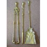 A late Victorian brass three piece fires