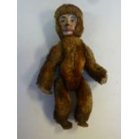 A 1930s Schuco brown mohair covered toy