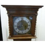 A 1920s oak cased grandmother clock, the