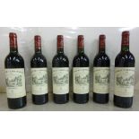 Six bottles of Chateau Carbonnieux 2000