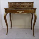 A late 19thC Louis XV inspired rosewood