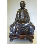 A mid 19thC Asian cast and patinated bro