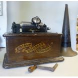An Edison Standard Phonograph, in a stai