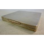An unfitted silver card case of rectangu