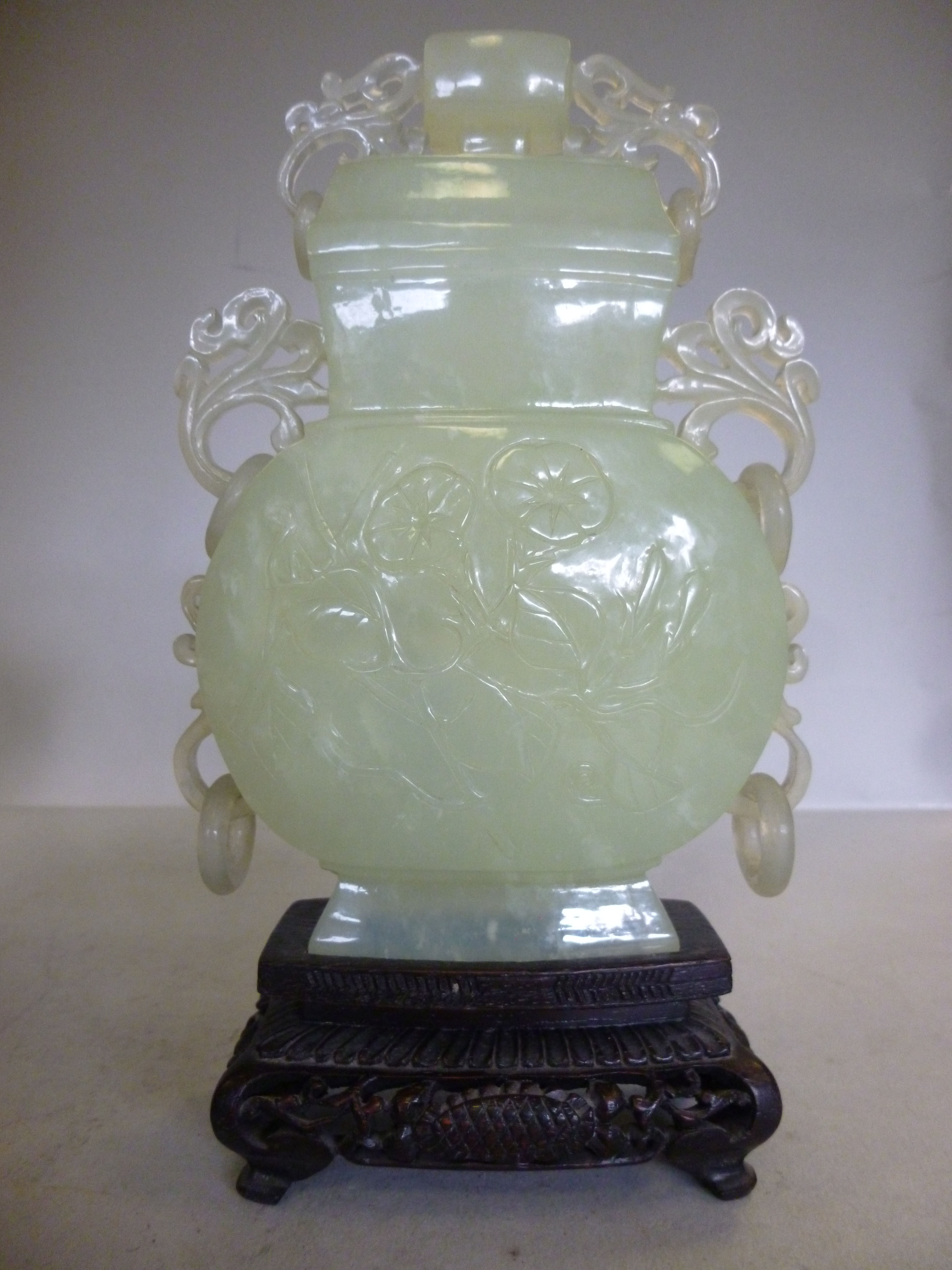 An early 20thC Oriental carved jade vase