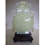 An early 20thC Oriental carved jade vase