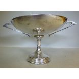 A silver tazza, having opposing, drawn l