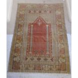 A Ghiordes prayer rug with a mirab on a