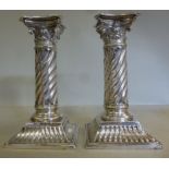 A pair of late Victorian loaded silver c