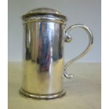 A Georgian style silver caster of cylind