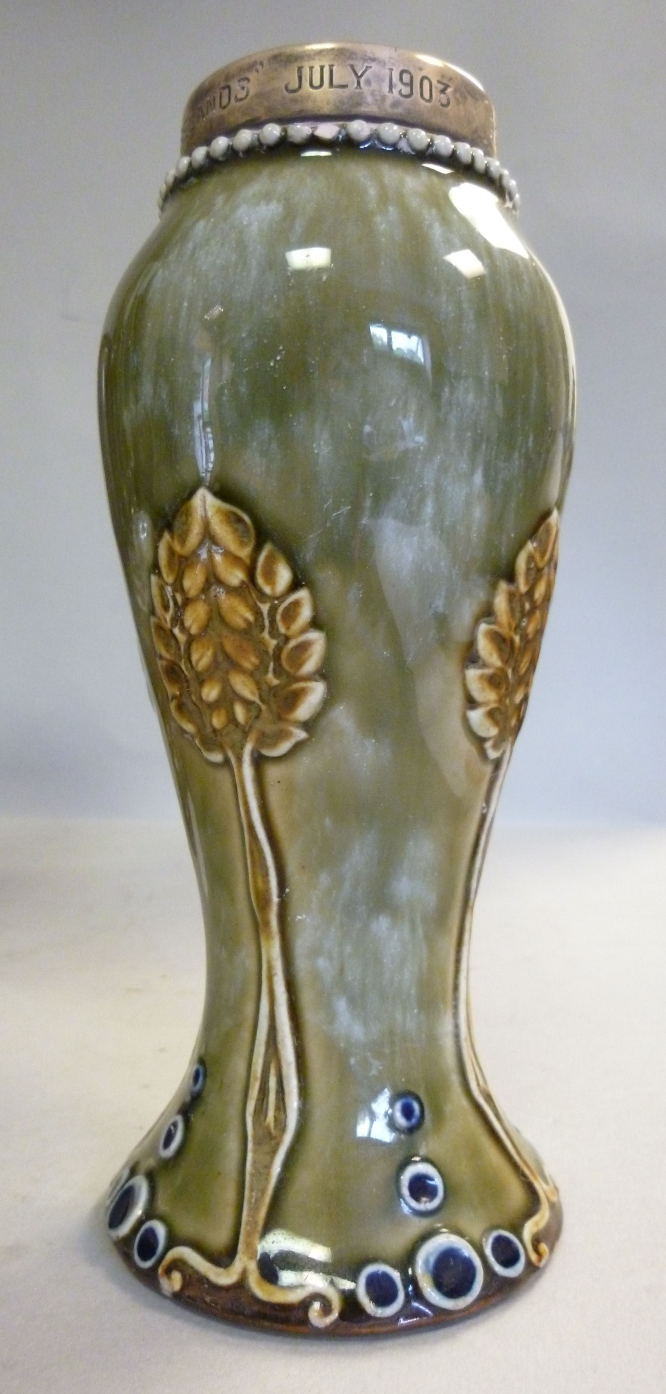 A Royal Doulton Art Nouveau green, brown