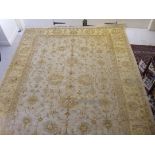 A Persian design carpet with palmettes,