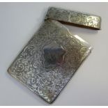 A silver card case of rectangular form w