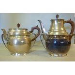 A four piece silver tea set of oval, bul