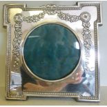 An Edwardian glazed silver photograph fr