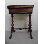 A late Victorian walnut games table, hav