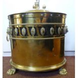 A Victorian brass oval coal bin, having
