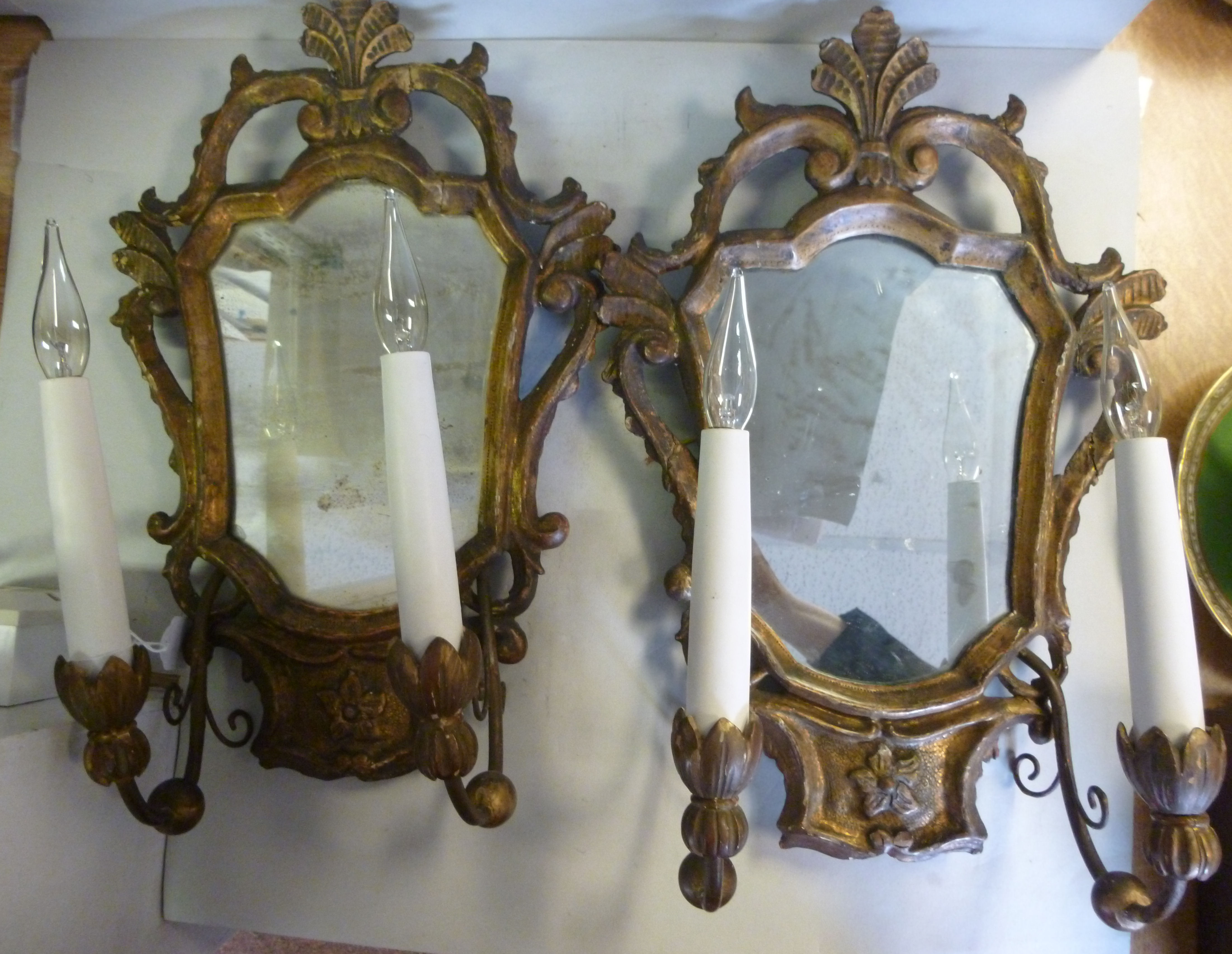 A pair of 19thC Continental carved, gilt