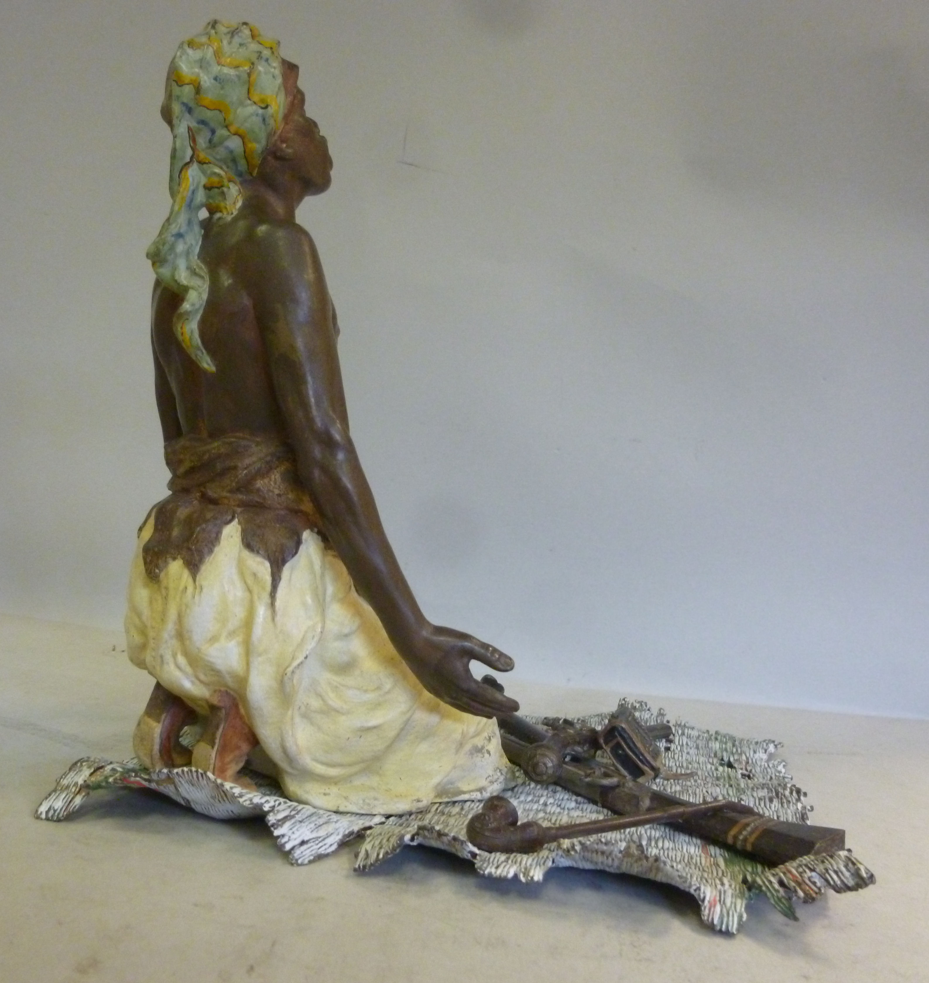 A Geschutzt Bergman cast and cold painted bronze figure, a Nubian kneeling on a rush mat, his arms - Image 3 of 8