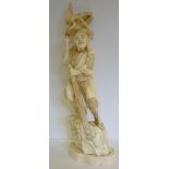 A late 19thC Japanese carved ivory figur