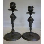 A pair of late 19thC cast and patinated
