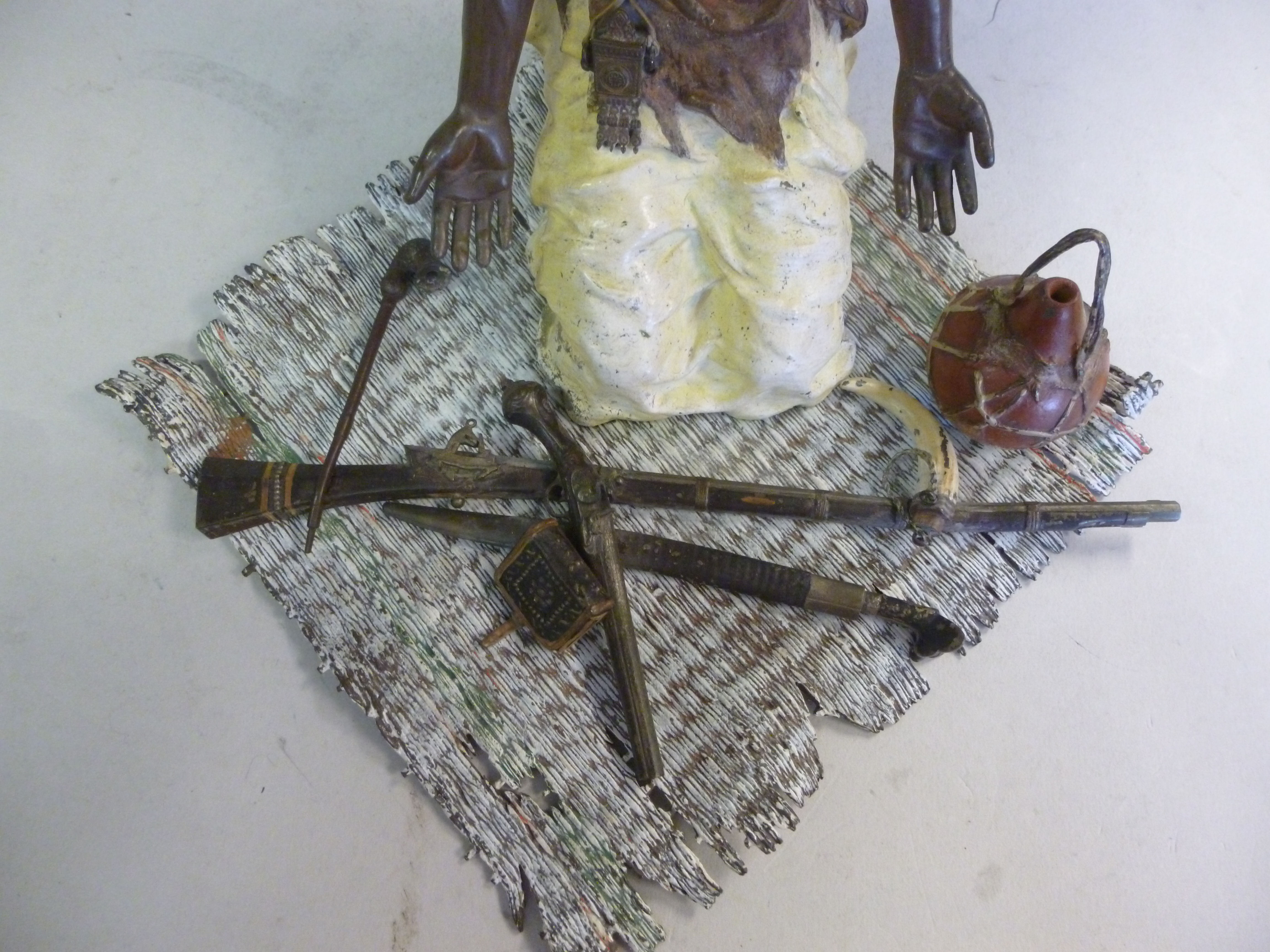 A Geschutzt Bergman cast and cold painted bronze figure, a Nubian kneeling on a rush mat, his arms - Image 5 of 8