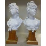 A pair of Royal Worcester ivory glazed c