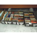 A large collection of paperback books, m