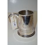 A silver tankard commemorating the Queen's Silver Jubilee 1977, decorated with "The College Of