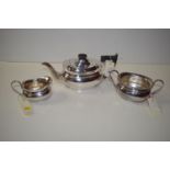 A three-piece silver tea service by Edward Viners, Sheffield 1961, of plain oval form. 39oz.