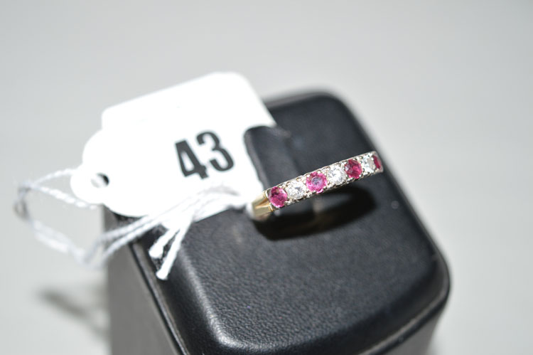 A ruby and diamond ring,