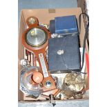 An aneroid barometer; plated ware, to include: an ice bucket, trays, flatware, in one box.