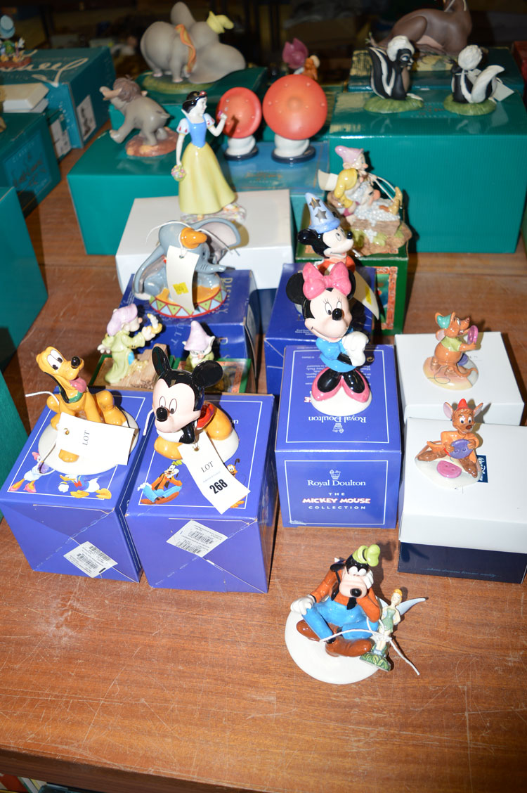 Royal Doulton Disney figurines, to include: Mickey Mouse, MM1; Mini Mouse, MM2; Pluto,