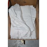 A quantity of good quality bed linen in a box.