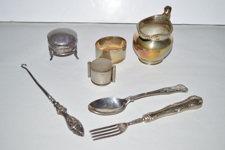 A quantity of silver items, to include: helmet form milk jug, by Samuel Blanckensee,