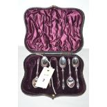 A part set of five teaspoons and matching sugar tongs, by J.