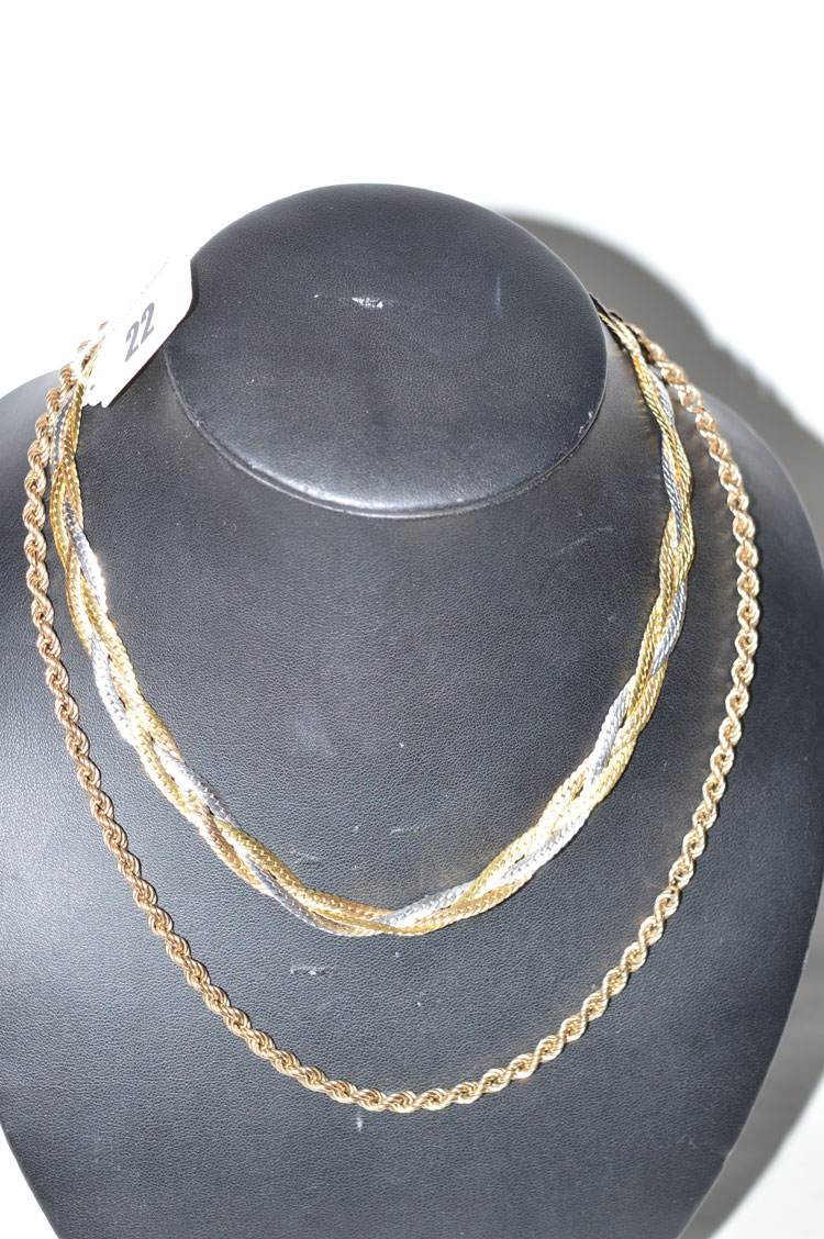 A 9ct. white rose and yellow gold necklace of twisted triple row form; together with a 9ct.