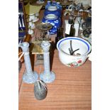 A French chamber pot with an eye in the bottom; a set of vintage kitchen scales; two glass bottles;