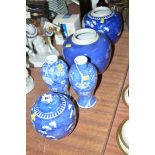 Three Oriental ginger jars; and a pair of blue and white Oriental vases.