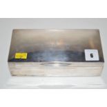 A silver mounted cigarette box, by Goldsmiths & Silversmiths Co. Ltd.