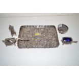 A three-piece silver condiment set of oval form, with gadrooned and foliate rim, paw feet,