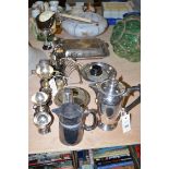 A collection of plated trophies and sundry plated metalware.