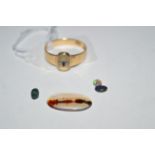 An agate stone set ring; another loose agate; and three loose opals.
