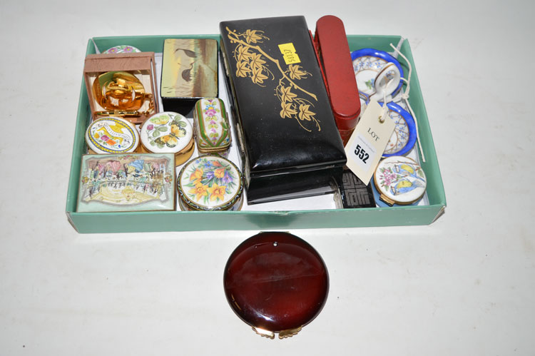 A collection of modern enamelled patch boxes; a travelling alarm clock; a powder compact; etc.