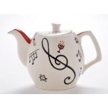 Gibsons: a teapot, decorated with musical notes, wine and stars,