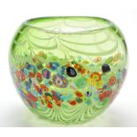 A Murano style millefiori rounded glass vase, with feather decoration to green ground, 18cms. (7in.