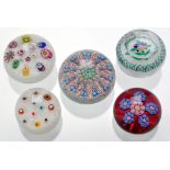 Two Perthshire paperweights: millefiori on latticino ground,